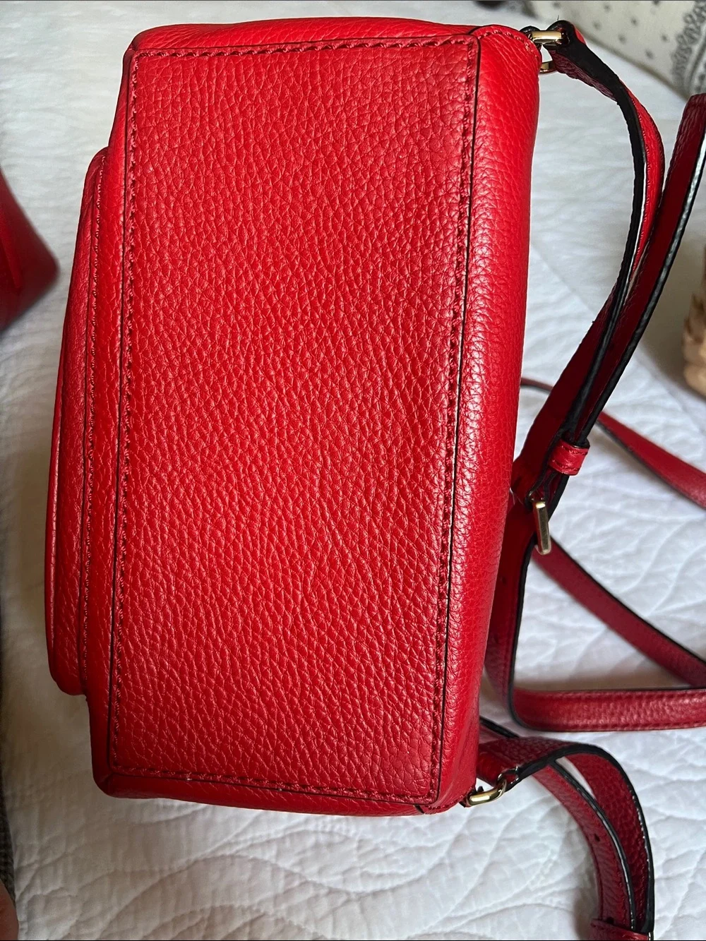 kate spade red pebbled leather mini backpack with gold hardware